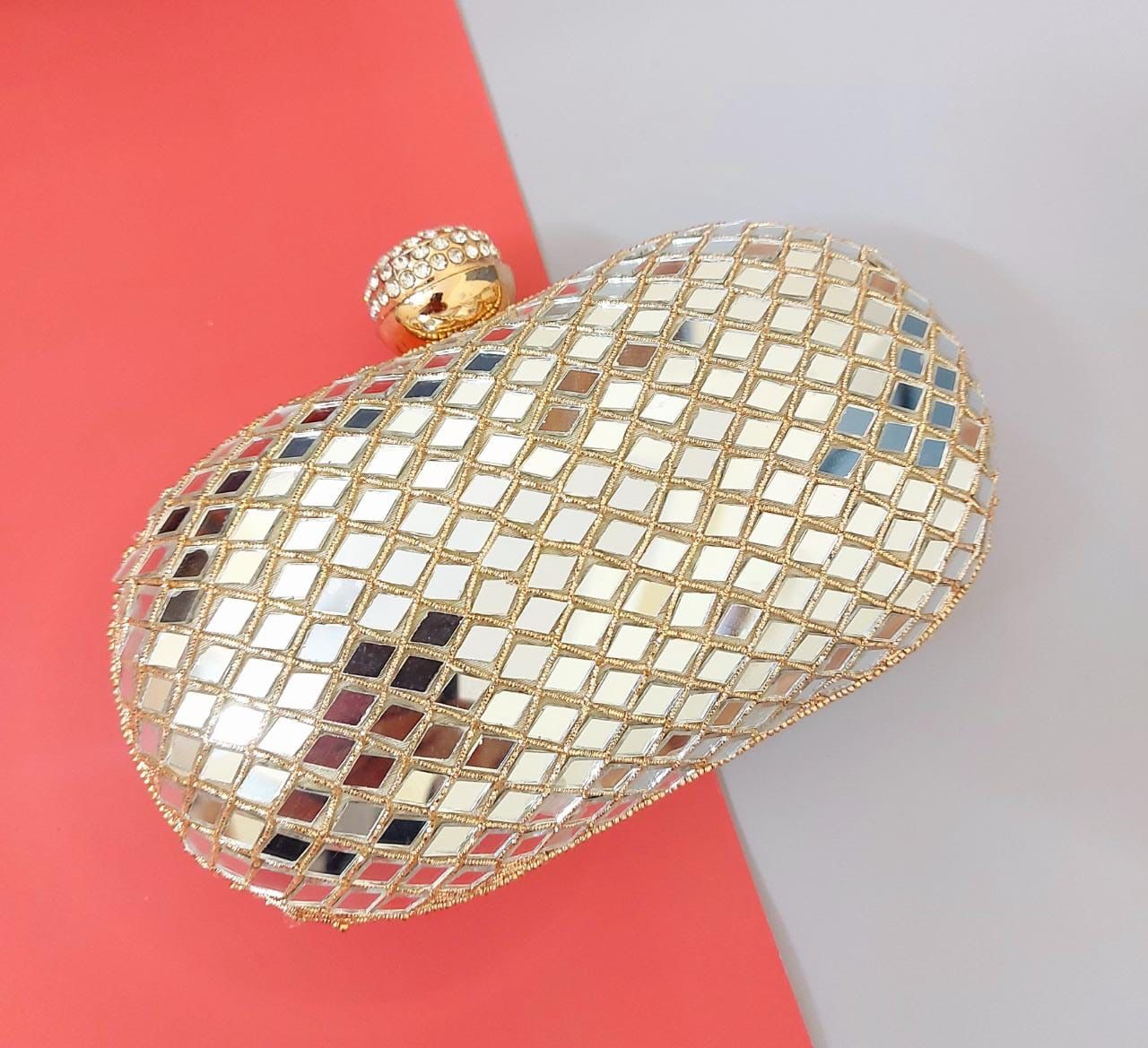 Heavy Embroidered Oval Clutch